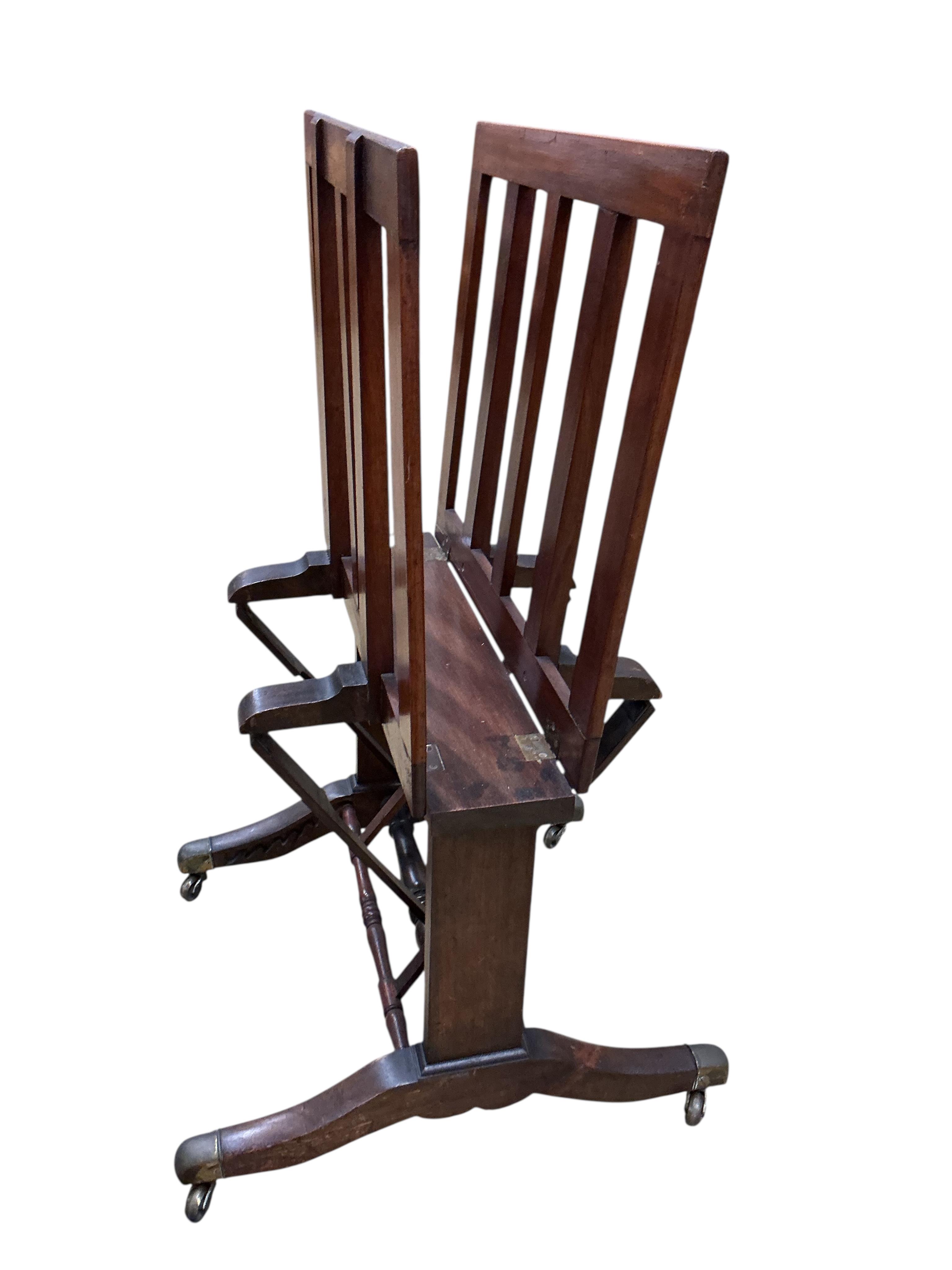 A Victorian mahogany folio stand, with adjustable sides united by turned stretchers, width 66cm, height 106cm